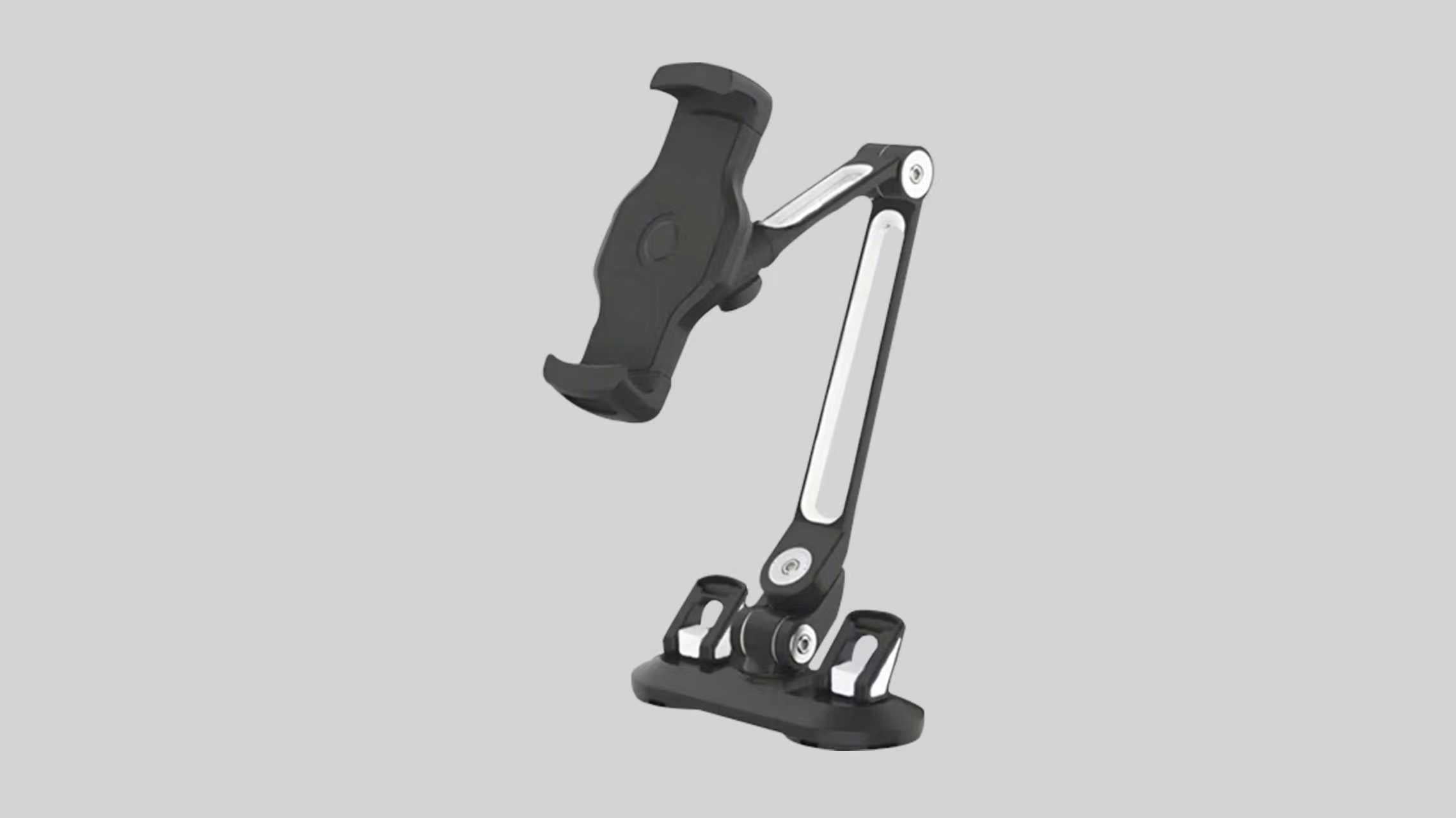 A black suction cup phone stand with an adjustable arm, featuring a clamp for securing devices and a stable base for versatile use.