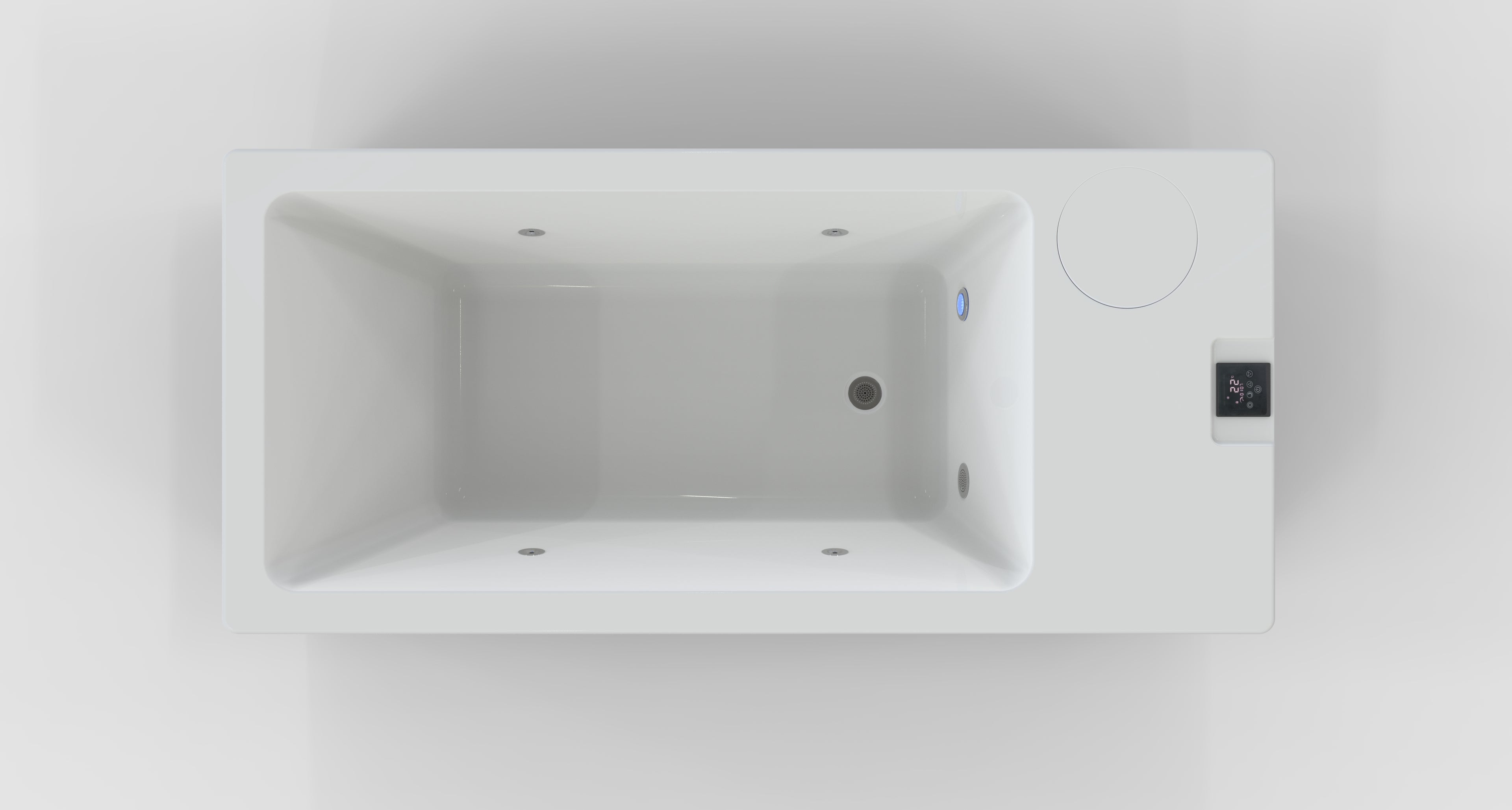 Top view of a sleek, modern ice bath tub with a built - in chiller and a control panel, featuring a clean white interior and black exterior with ventilation grilles for efficient cooling