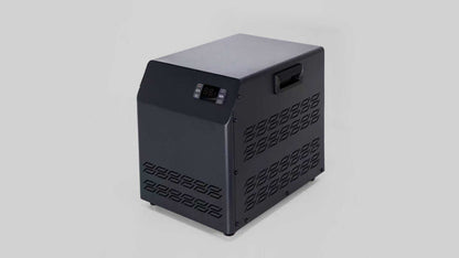 Other side of a compact, black, low - power bathtub refrigerator with a digital control panel and perforated ventilation panels.