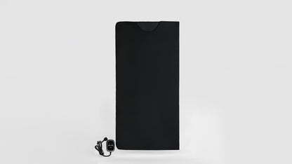 A black PU leather folding massage blanket with a controller, designed for far-infrared heating, lightweight, foldable, waterproof, and easy to store.